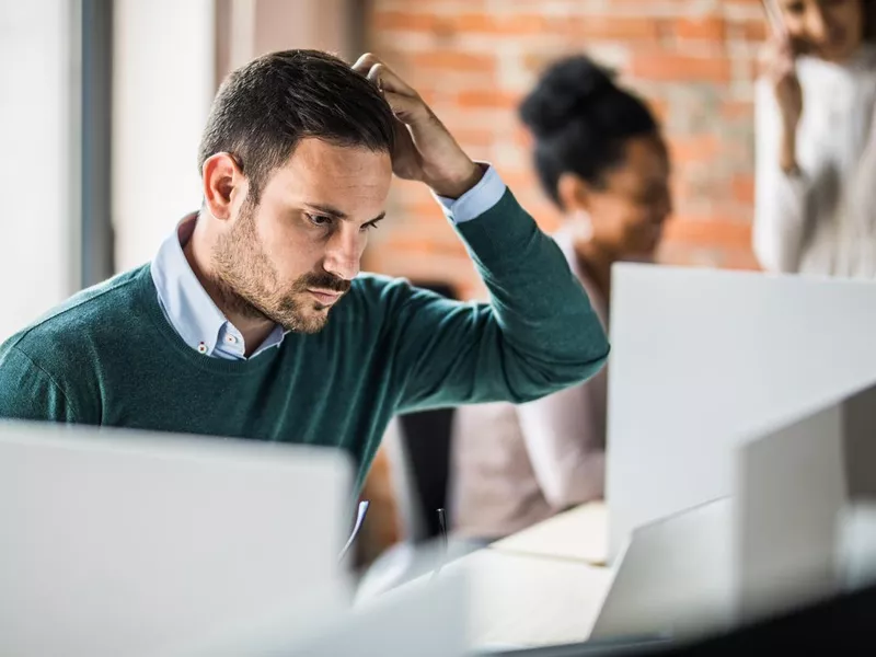 Worried and confused businessman