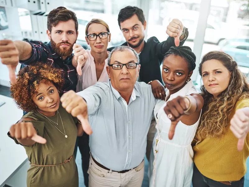 Unhappy group of workers