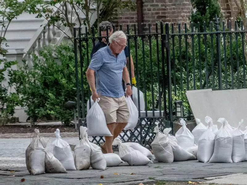 man preparing for hurricane