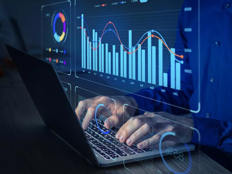 Data analyst working on business analytics dashboard