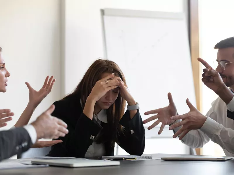 Management arguing over employee