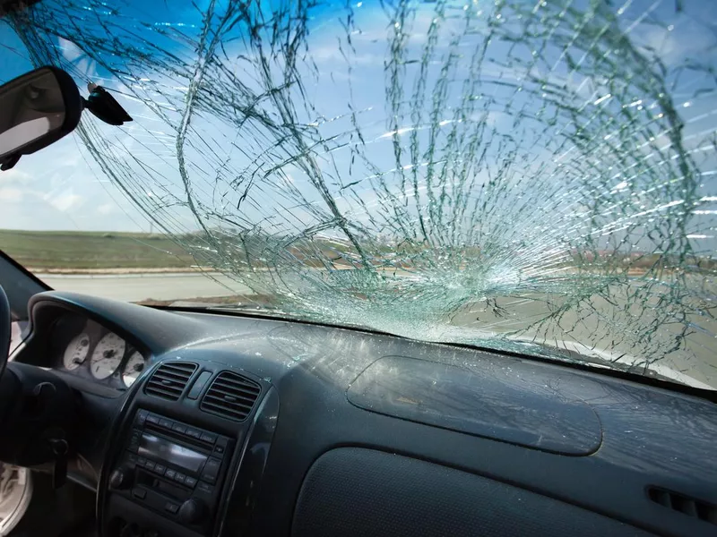 Inside of car with the broken windshiel