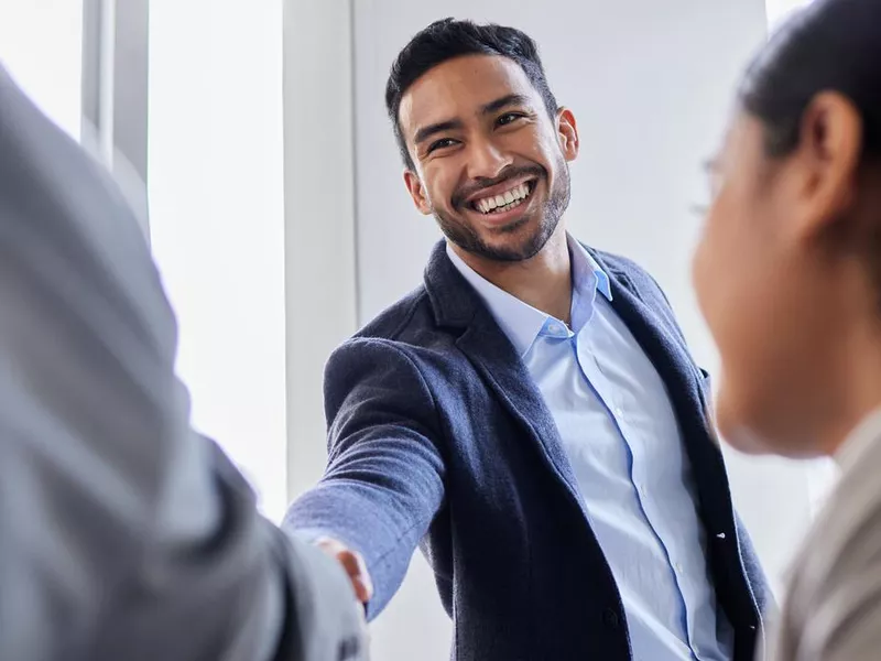 Shot of two business people networking