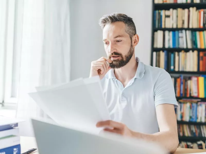 Man reading papers