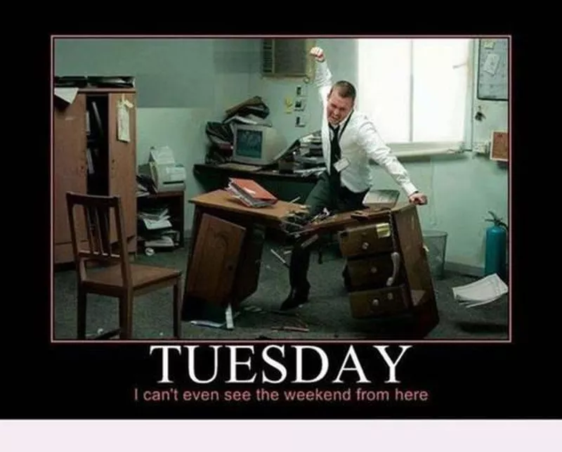 Man breaking a desk because it's only Tuesday