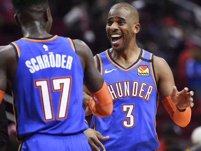 Oklahoma City Thunder guard Chris Paul celebrates team's win