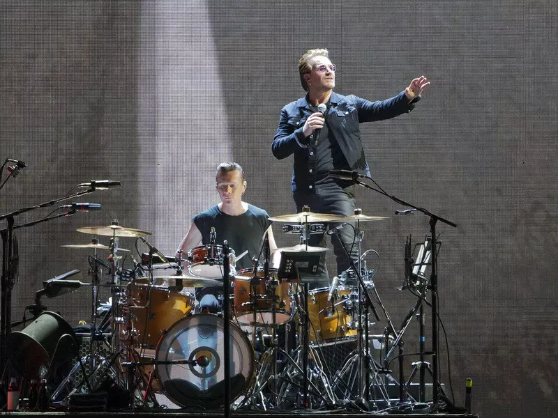 Larry Mullen Jr. with Bono