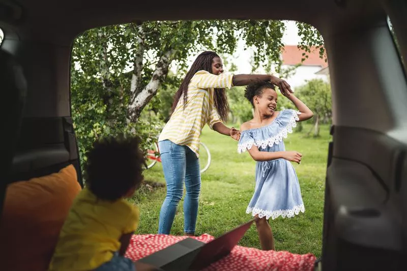 Dancing outside a van