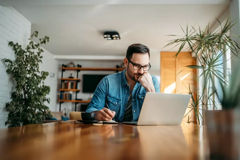 Man writing emails