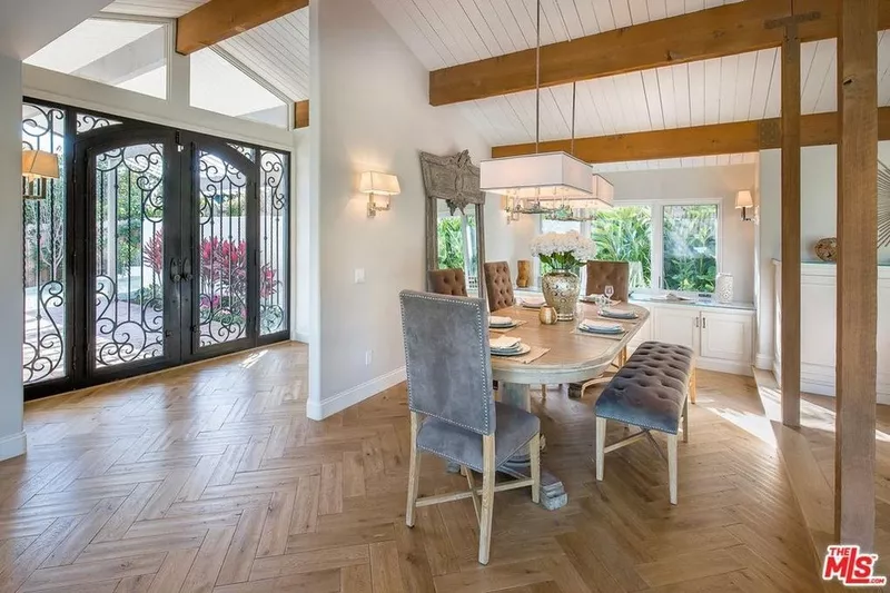 Dining room with large front doors