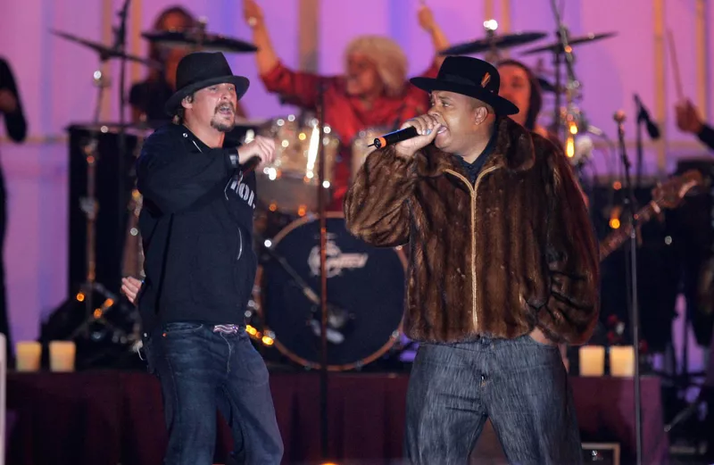 Rev. Run performing with Kid Rock