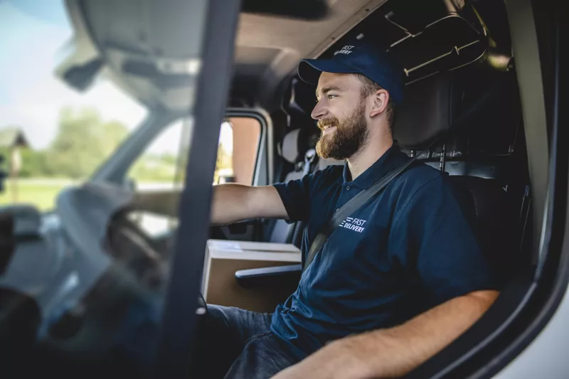 Delivery driver smiling