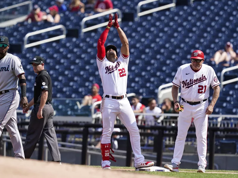 Washington Nationals' Juan Soto celebrates his single