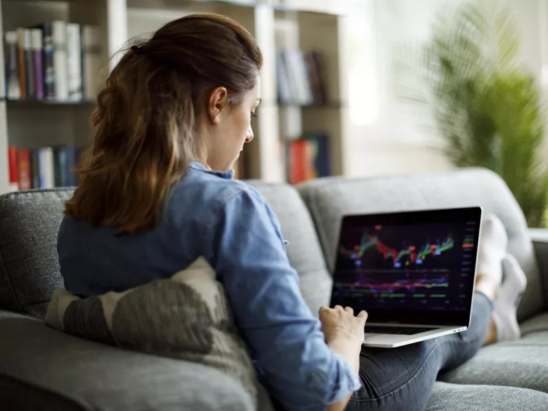 Young woman trading online