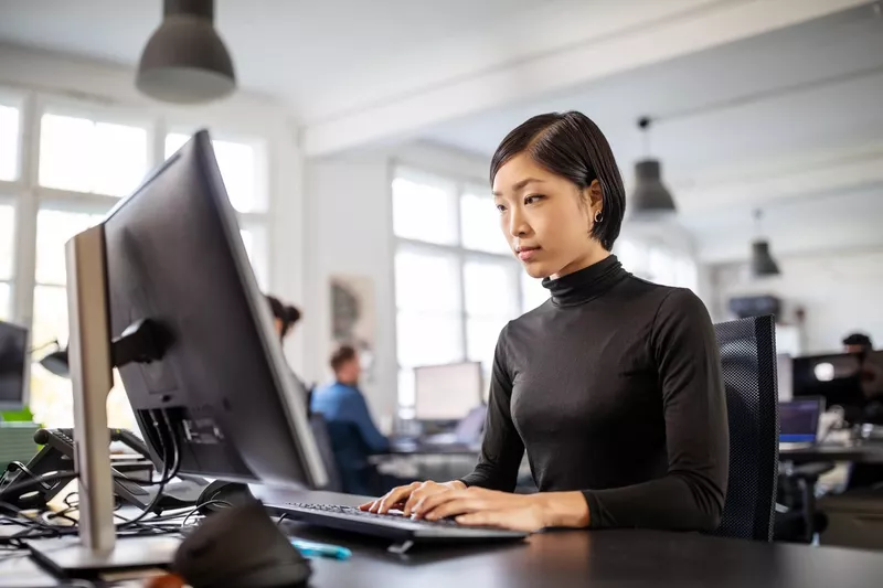 Woman working at her desk