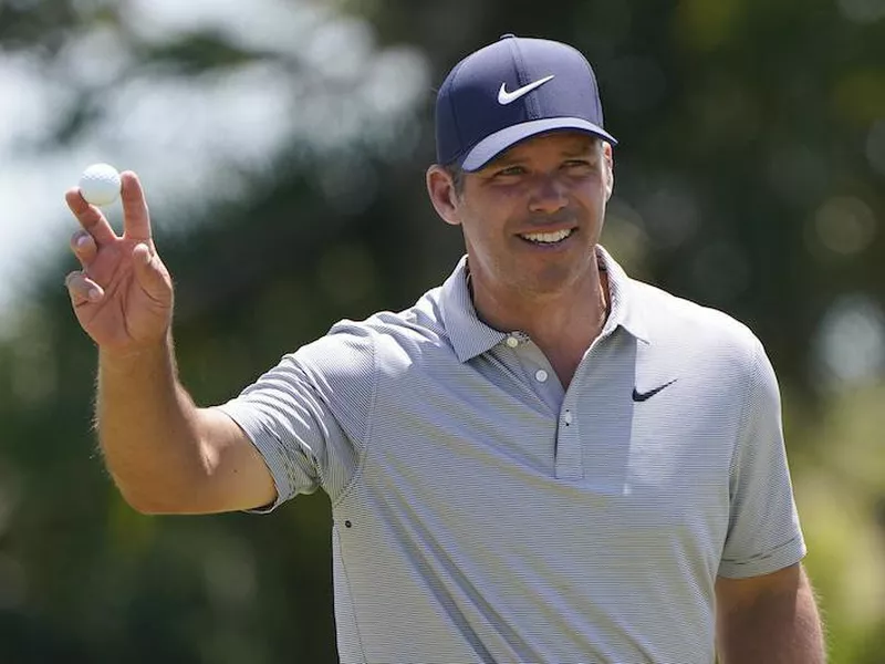 Paul Casey waves on second hole