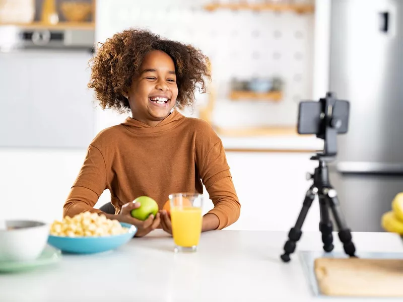 Girl vlogging at home.