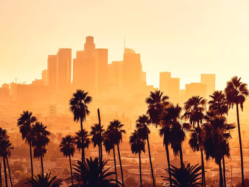 Los Angeles golden hour cityscape over downtown skyscrapers