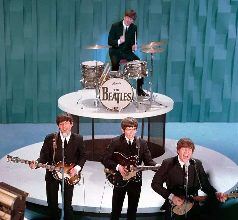 Ringo Starr performing with The Beatles on 'The Ed Sullivan Show in 1964