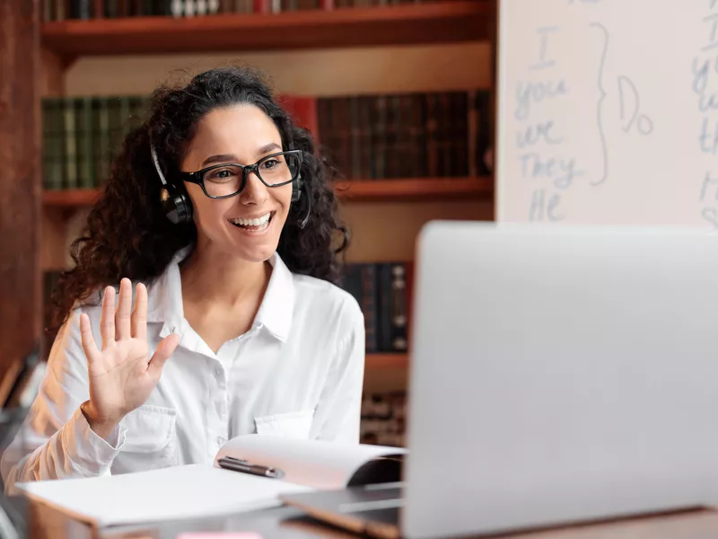 Woman teaching online at home