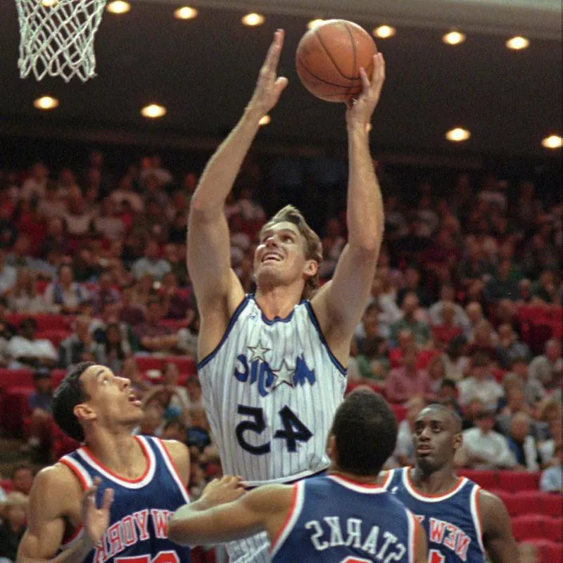 Orlando Magic's Jon Koncak shoots for basket