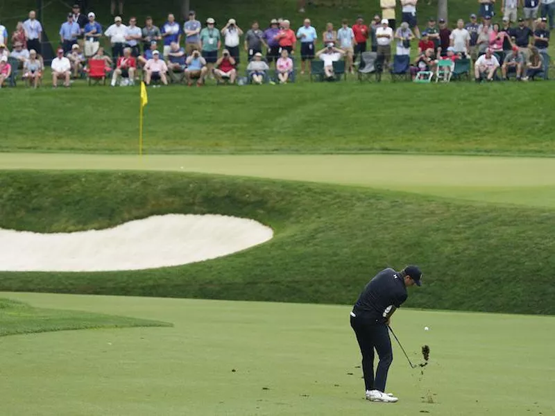 Jordan Spieth hits to 11th green