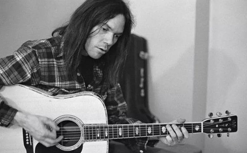 Neil Young with guitar