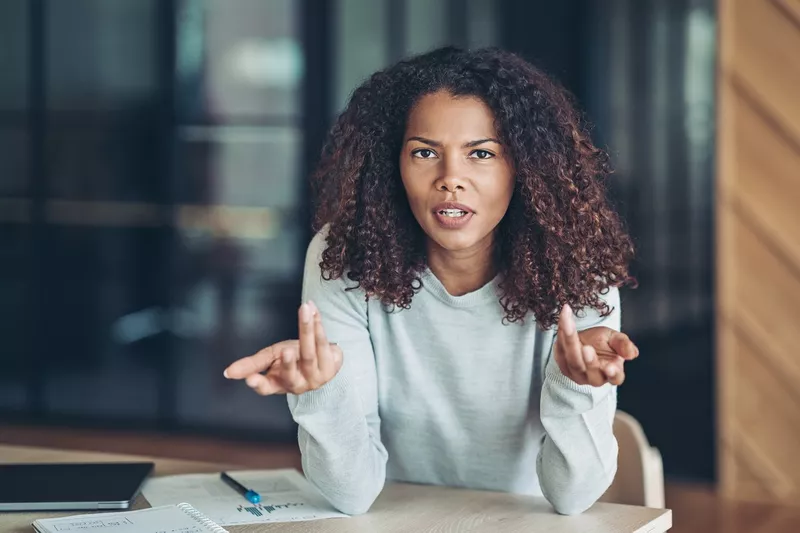 Woman giving WTF hands