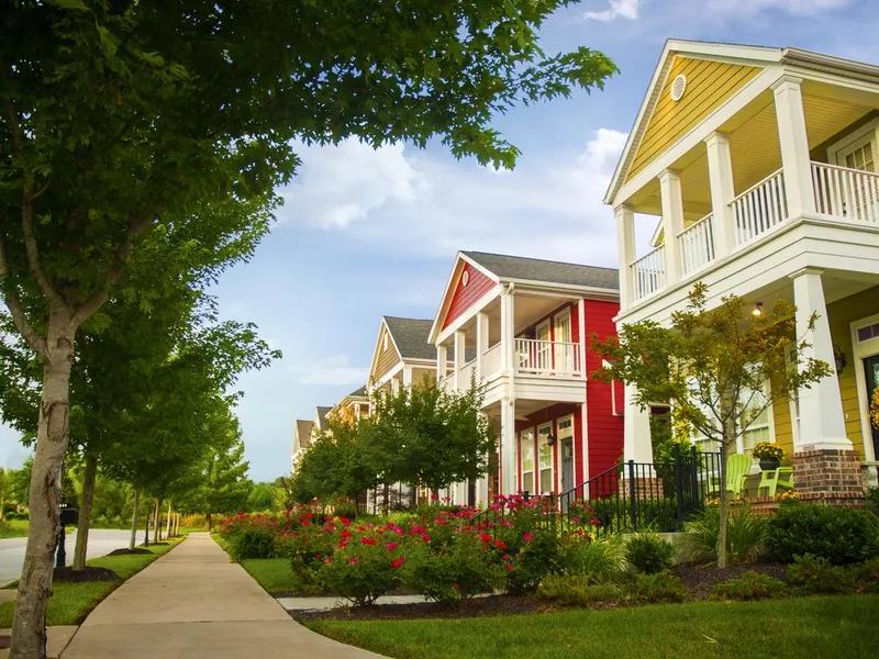 Row of colorful garden homes in suburban area