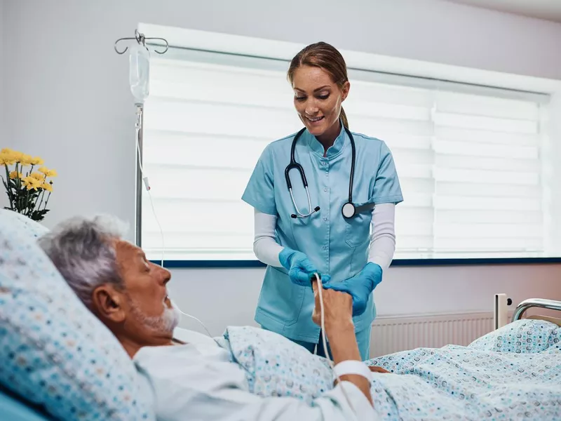 Nurse monitoring blood pressure