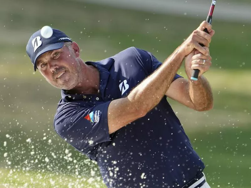 Matt Kuchar hits out of sand