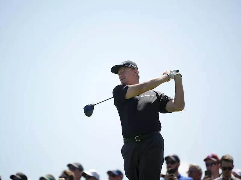 Ernie Els watches his tee shot