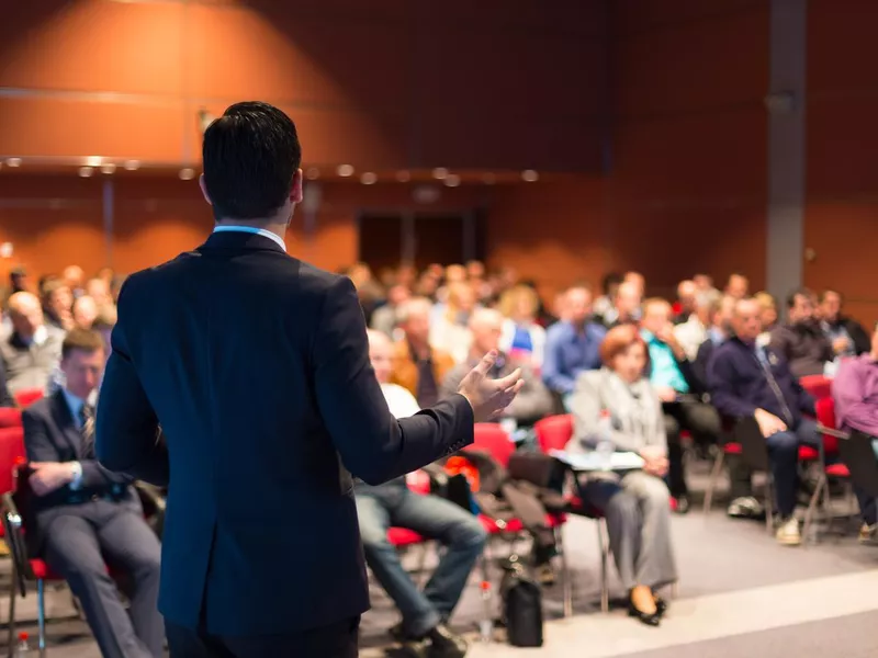 A Man Speaking at a Business Conference