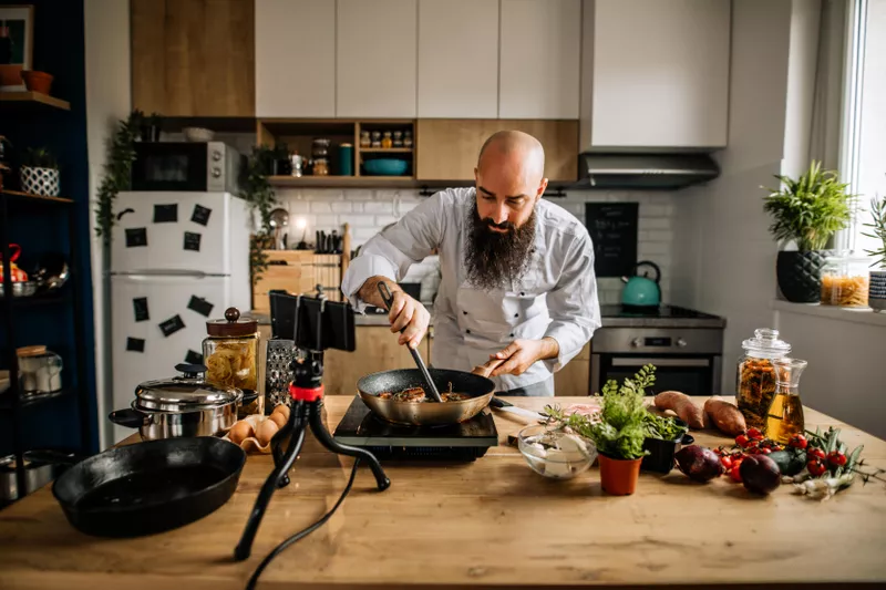 A chef preparing steak