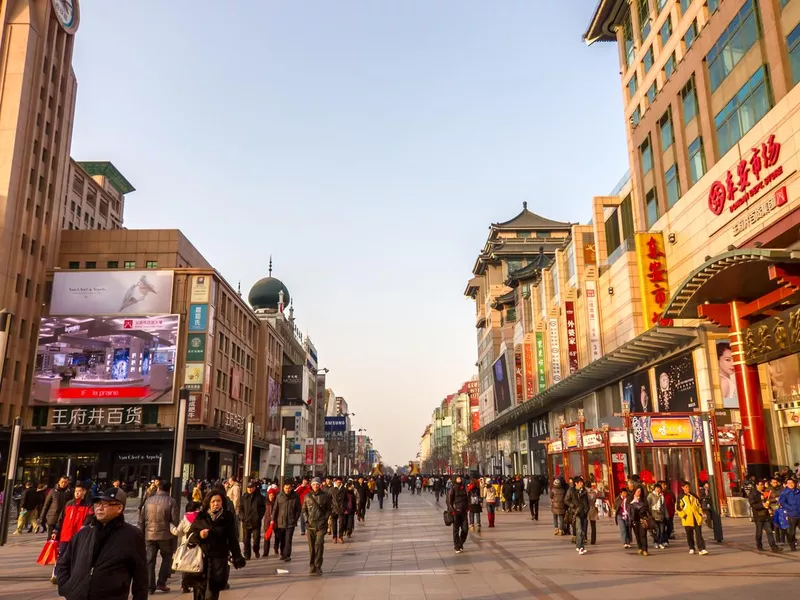 Crowds of people walking in Beijing