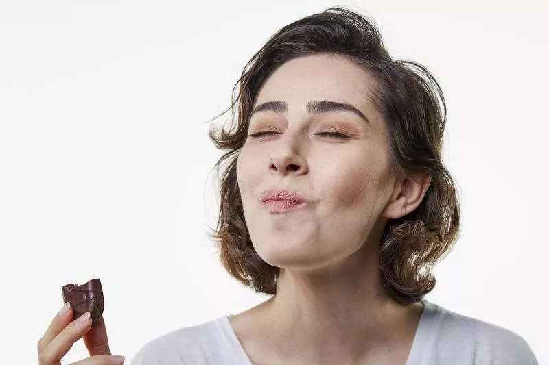 Girl eating chocolate