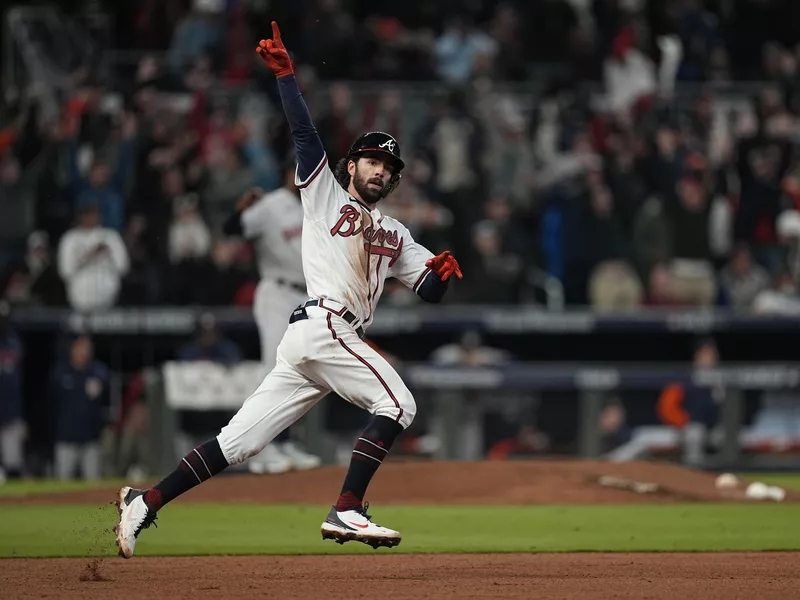 Atlanta Braves' Dansby Swanson celebrates home run