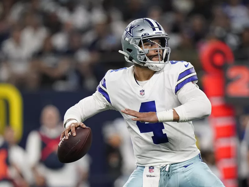 Dallas Cowboys quarterback Dak Prescott looks to pass