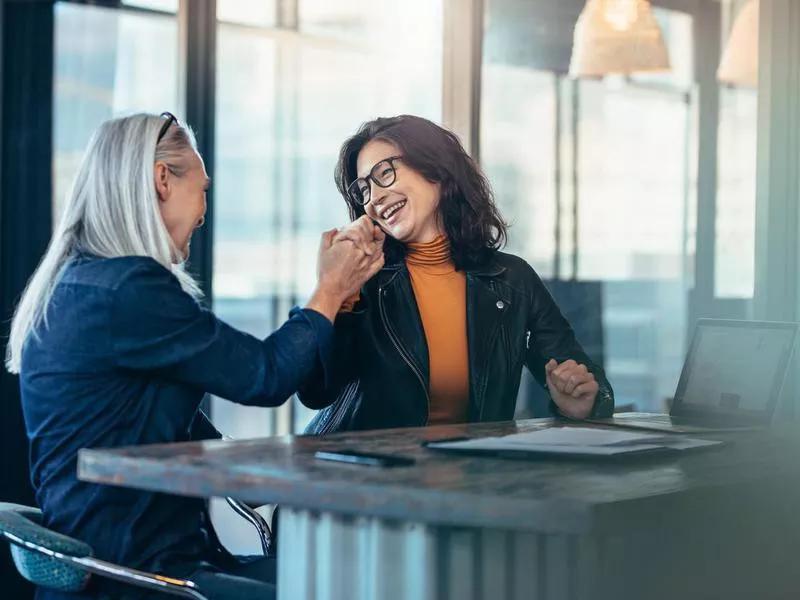 Two women working