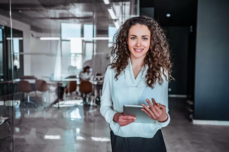 Modern business woman with tablet