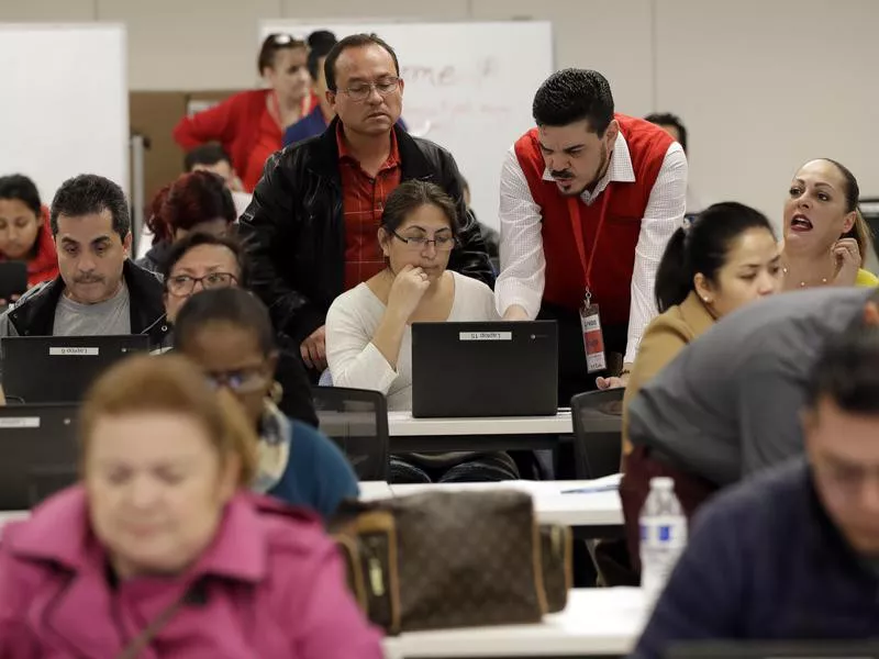 Workers apply for unemployment benefits in Los Angeles