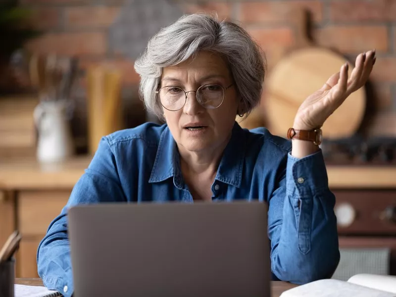 Woman translator at a laptop