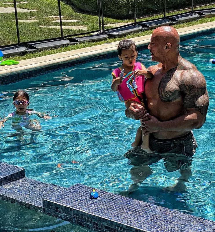 Dwayne Johnson in a pool