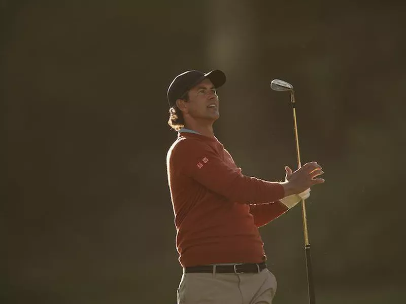 Adam Scott hits his second shot