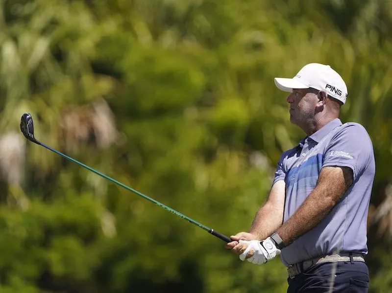 Stewart Cink watches his tee shot