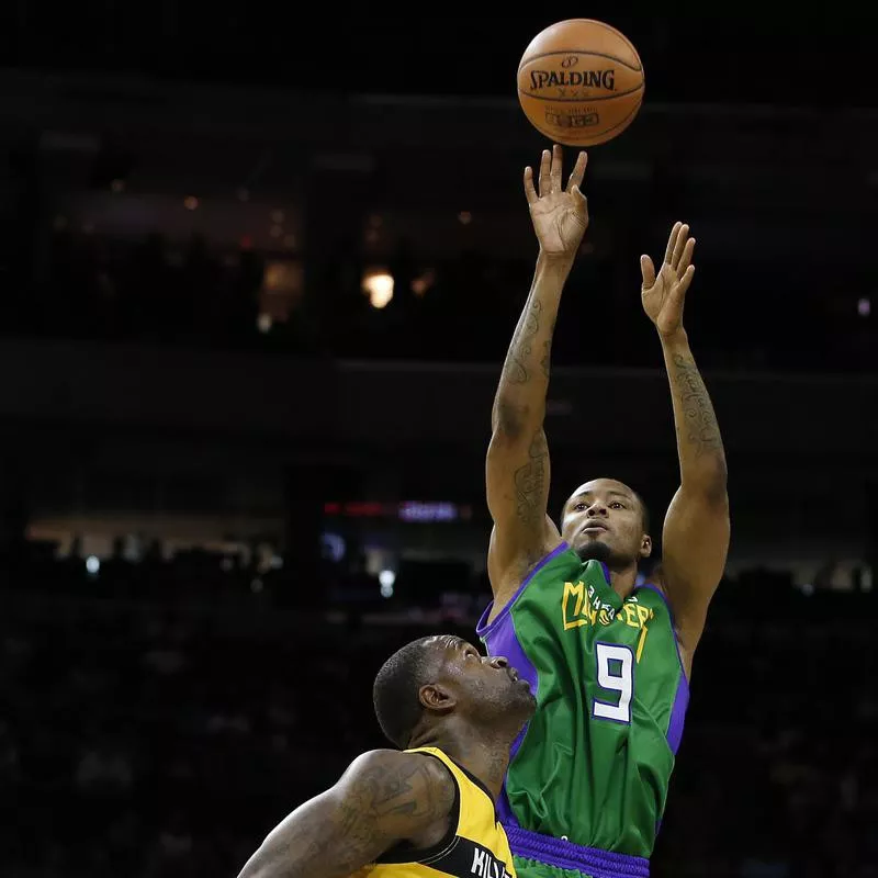 Rashard Lewis attempts shot against Stephen Jackson