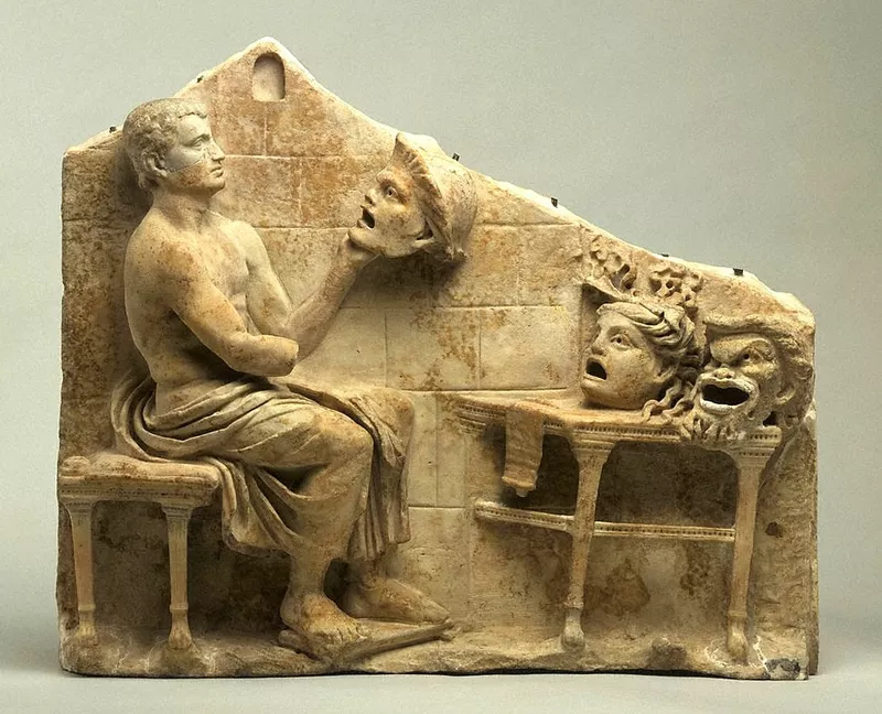 Relief of a Seated Poet With Masks of New Comedy