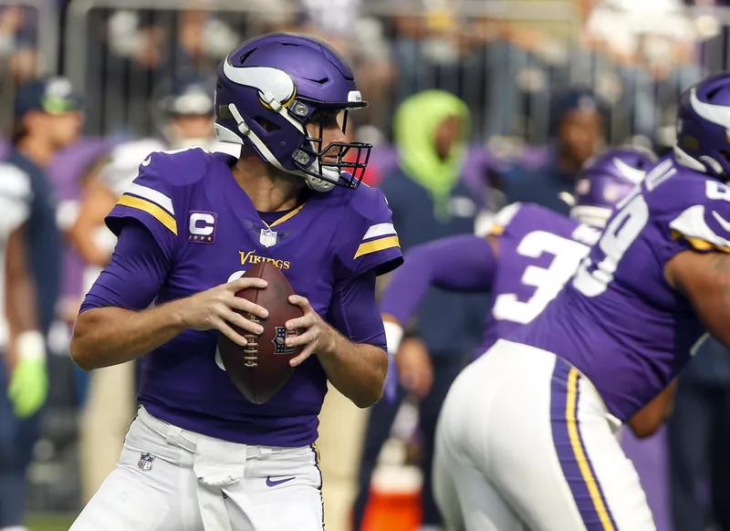 Kirk Cousins prepares to throw