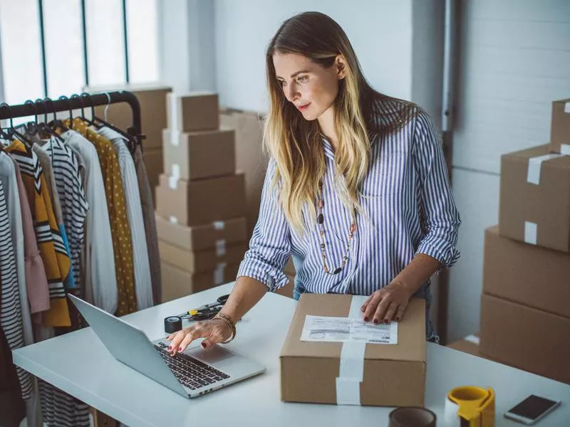 Woman selling her items online