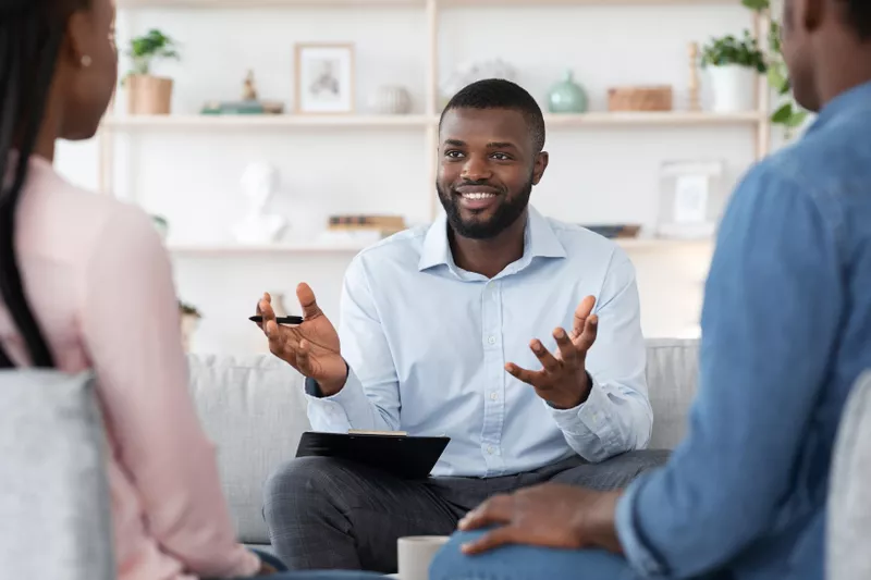 Psychologist talking to clients